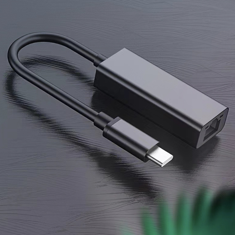 Adaptateur ethernet USB en aluminium, trois versions Adaptateur ethernet USB en aluminium, trois versions, vue de trois quarts
