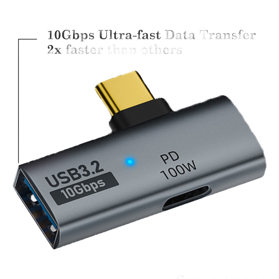 Adaptateur USB-C OTG deux en un avec charge 100 W Adaptateur USB-C OTG deux en un avec charge 100 W, vue de trois quarts
