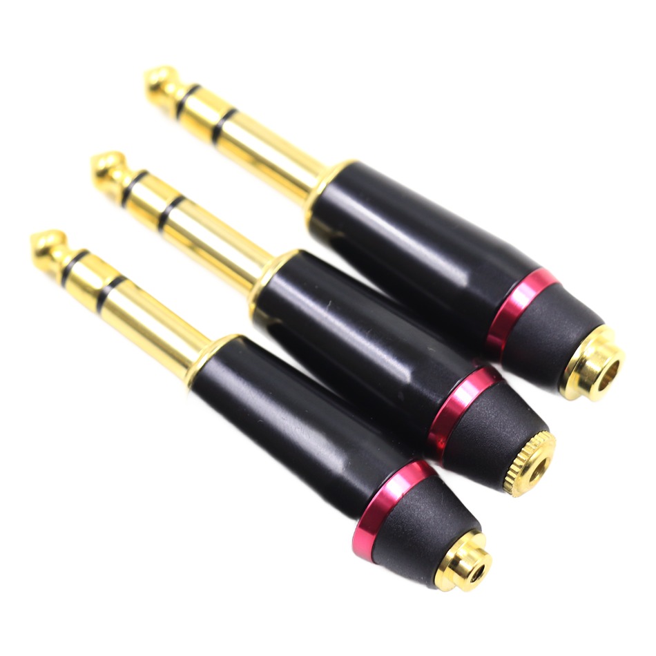 Adaptateur jack 6.35 mâle pour casque à fiche 3,5, 4,4 ou 2,5 mm Adaptateur jack 6.35 mâle pour casque à fiche 3,5, 4,4 ou 2,5 mm, vue de trois quarts