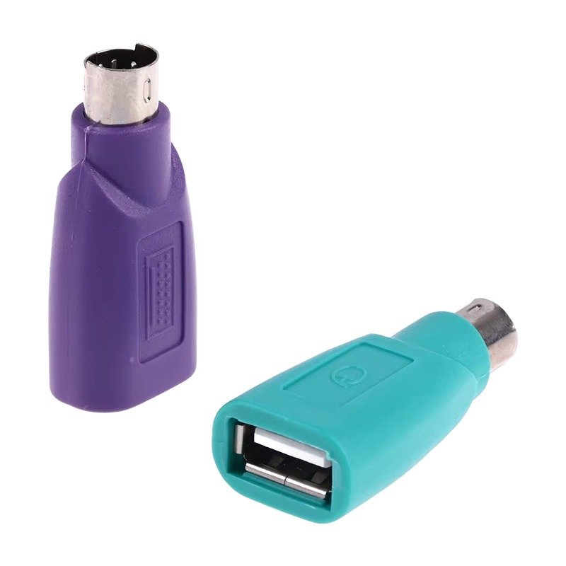 Adaptateur PS2 mâle vers prise USB femelle, violet ou vert Adaptateur PS2 mâle vers prise USB femelle, violet ou vert, vue de face