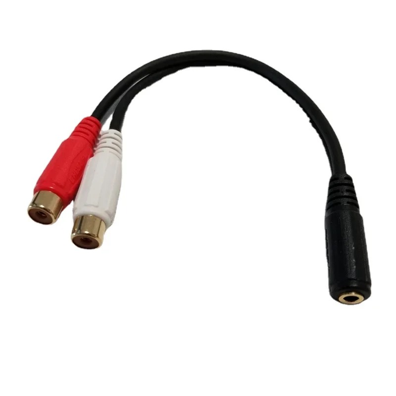 Adaptateur RCA vers jack, deux RCA femelles et prise 3,5 mm femelle Adaptateur RCA vers jack, deux RCA femelles et prise 3,5 mm femelle, vue de trois quarts